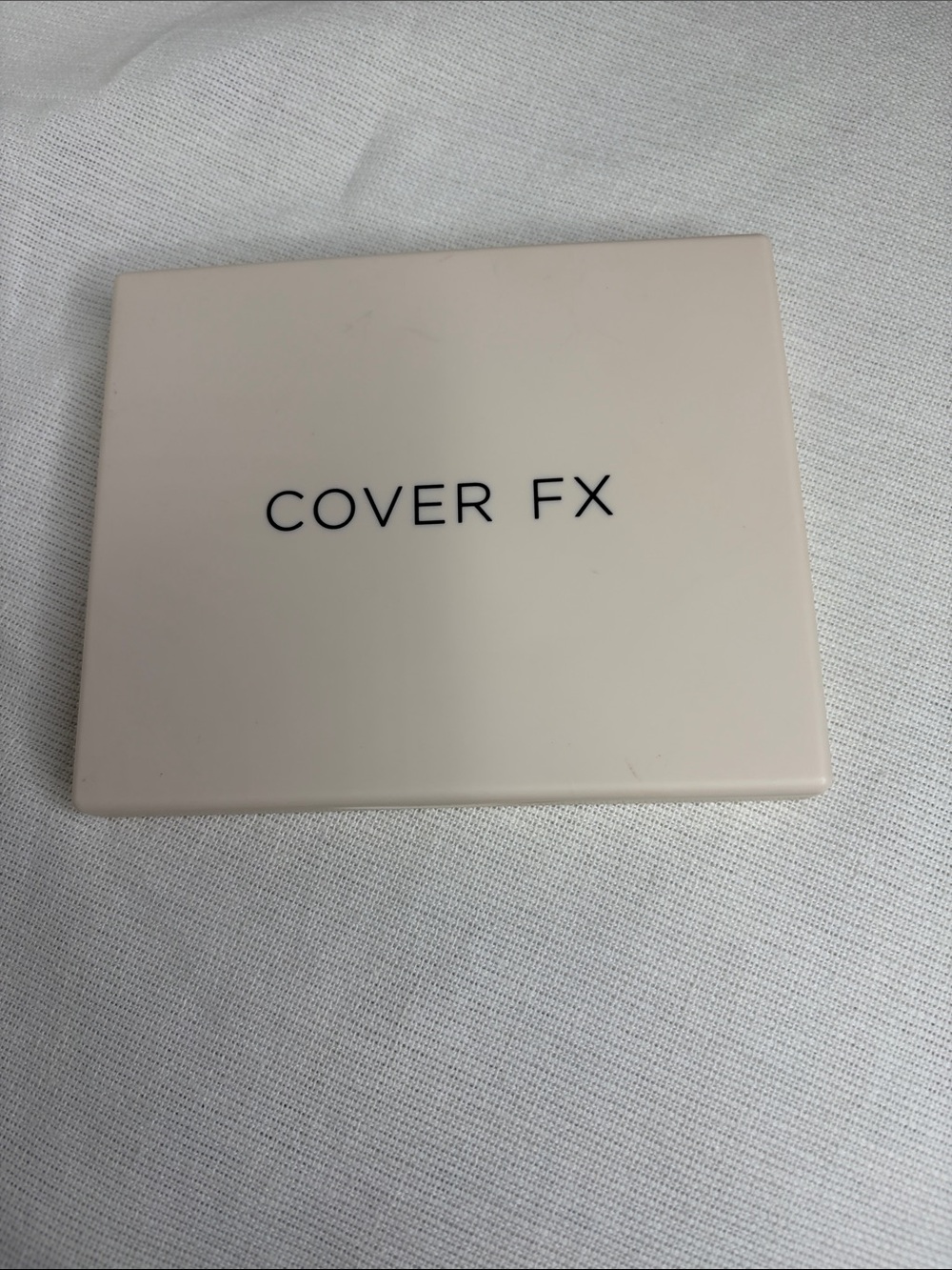 COVER FX Compact Bronzer Case in Pale Pink-Beige with Black Logo